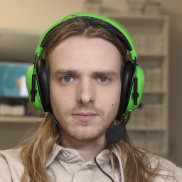 Justionas Gibas wearing headphones